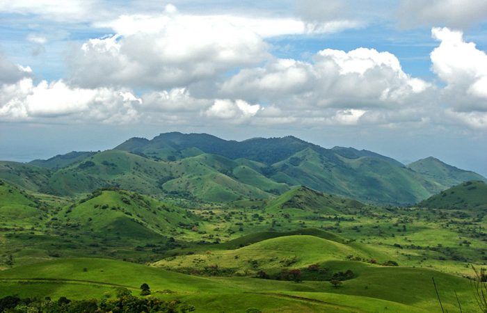 the grassy green hills inside Chyulu Hills National Park, Kenya