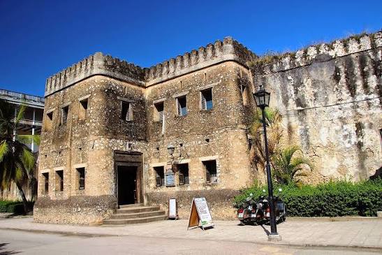 Ancient Zanzibar Old Fort overlooking Stone Town with historic coral stone walls and courtyard