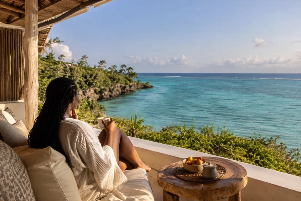 Elegant generic coastal lodge terrace overlooking turquoise Indian Ocean, no hotel name
